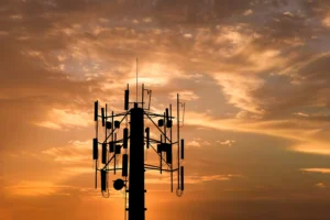 Cellular network tower supporting NB-IoT, LTE-M, and Cat-1 bis IoT connectivity