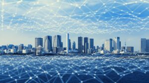 IoT-connected city skyline representing smart building automation and control systems