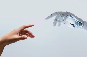 Robotic hand reaching toward a human hand, representing physical AI's dependence on connectivity infrastructure